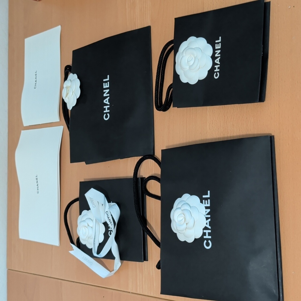 Chanel Black Bag Set with White Floral Detail